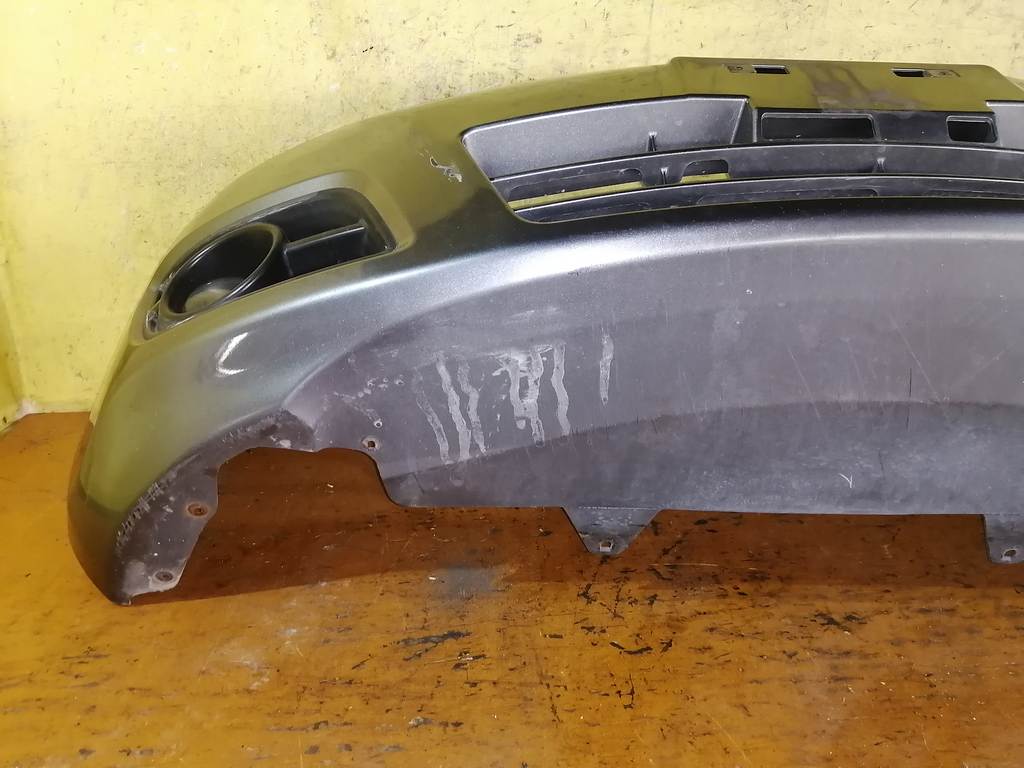 бампер Nissan Note