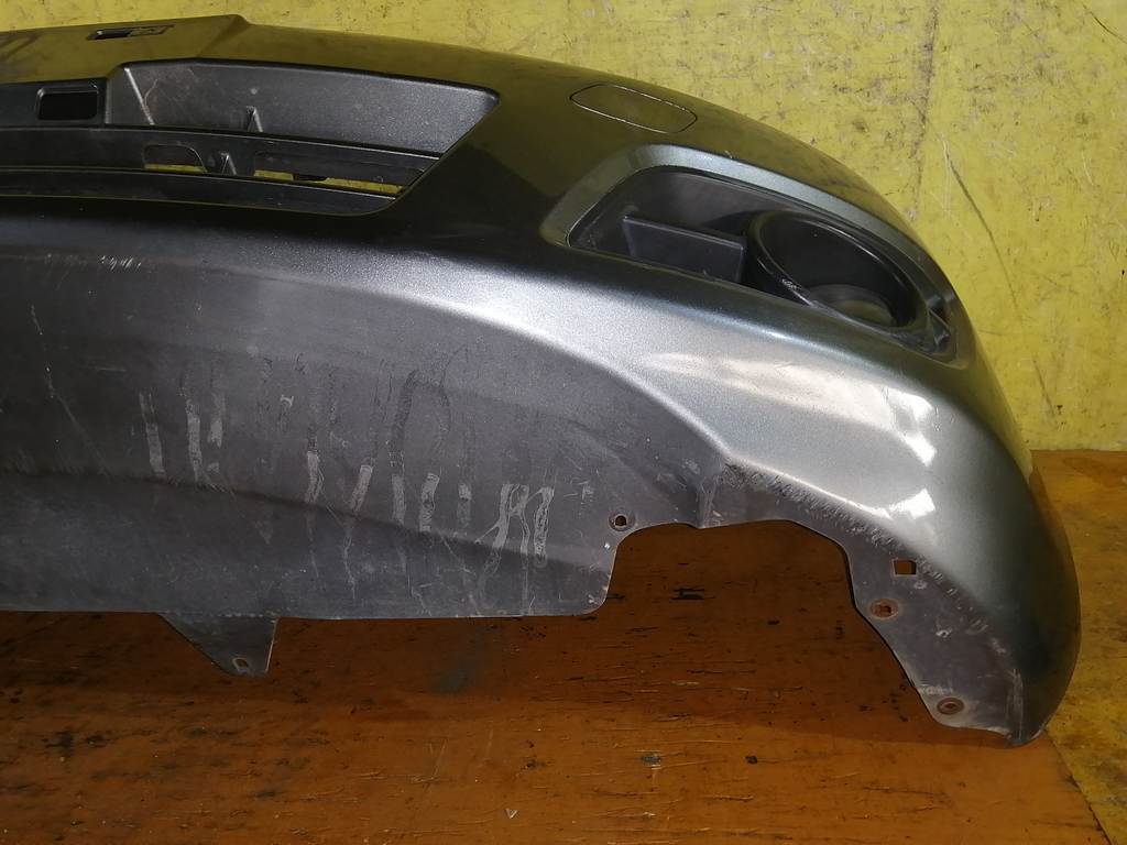 бампер Nissan Note