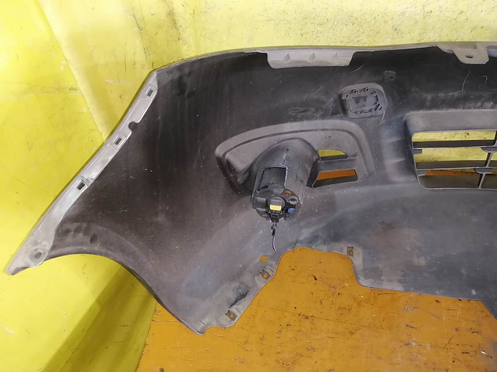 бампер Nissan Note