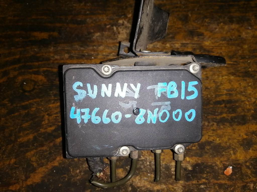 блок abs Nissan Sunny