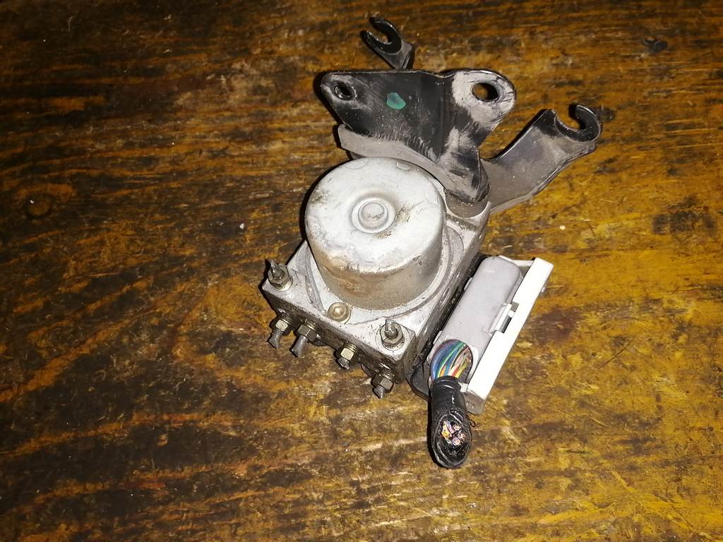 блок abs Mazda Demio
