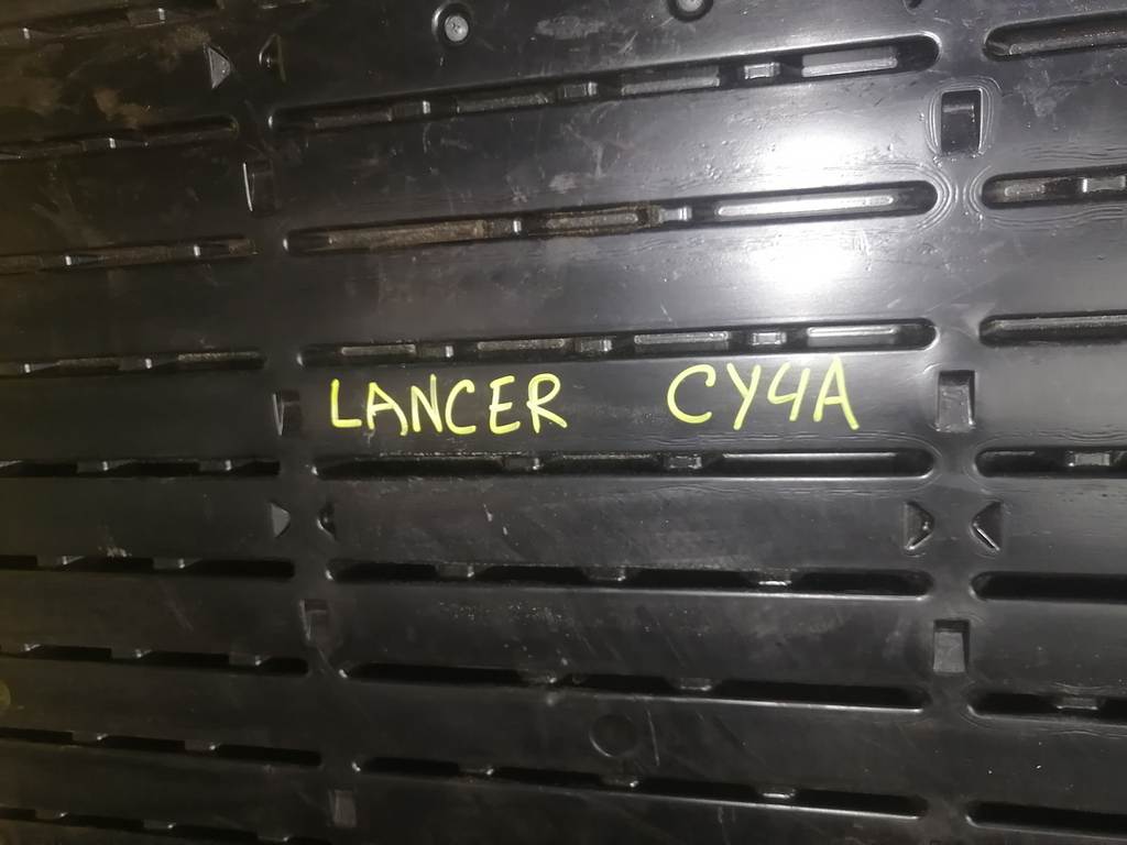 полка багажника Mitsubishi Lancer