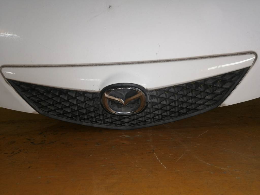 капот Mazda Demio