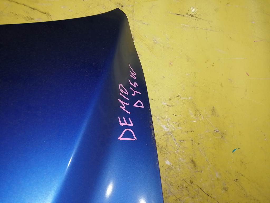 капот Mazda Demio