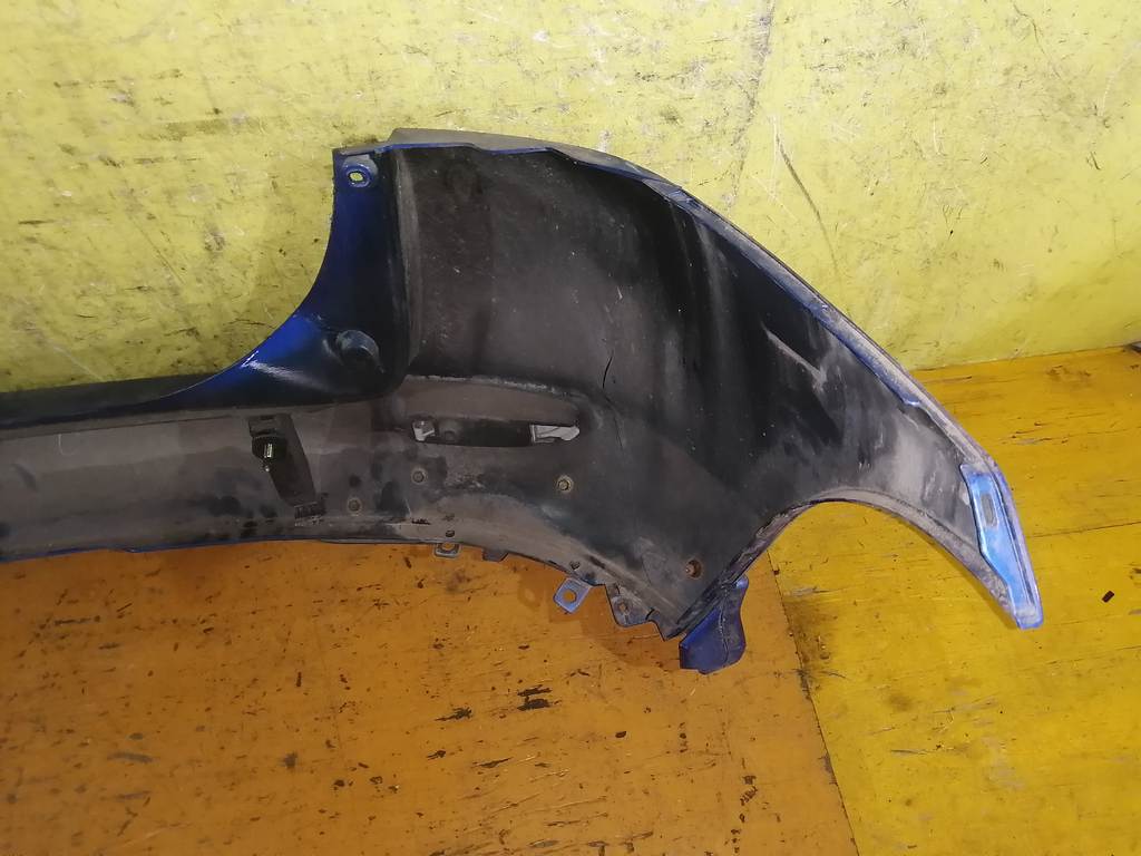 бампер Mazda Demio