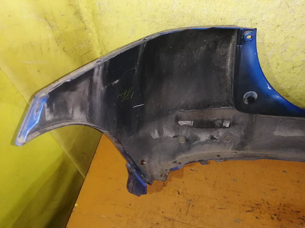 бампер Mazda Demio
