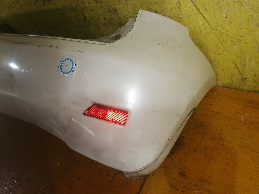 бампер Nissan Note