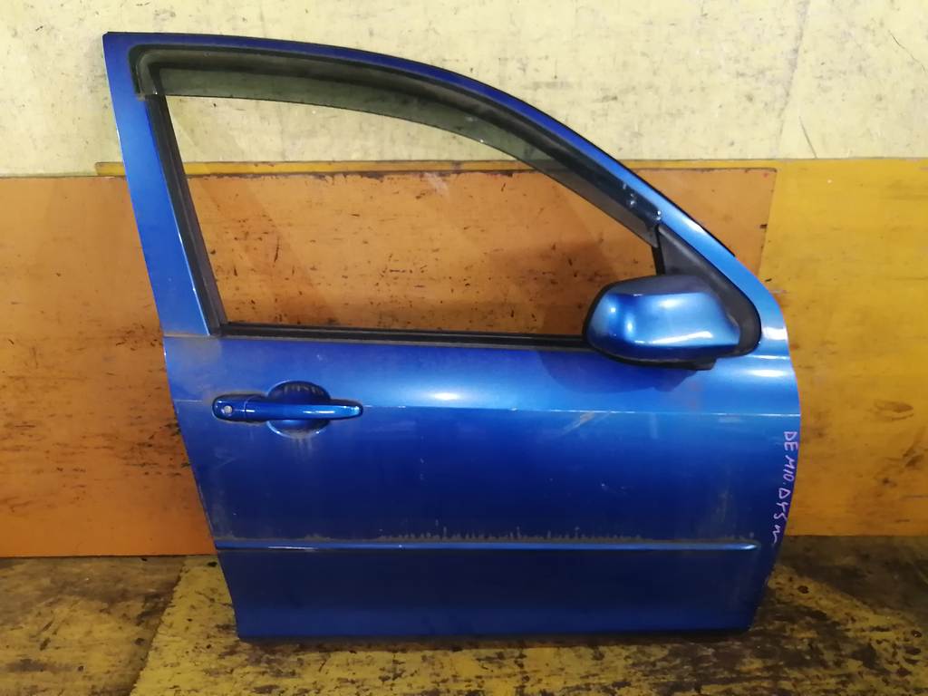 дверь Mazda Demio