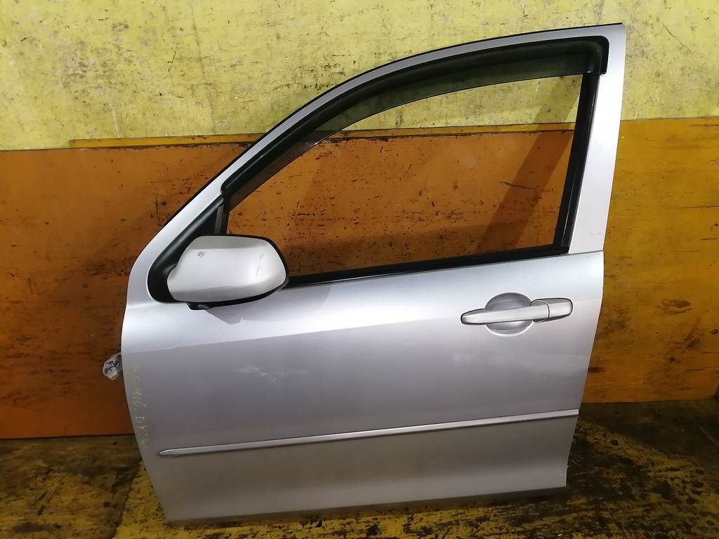 дверь Mazda Demio