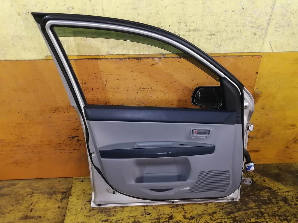 дверь Mazda Demio