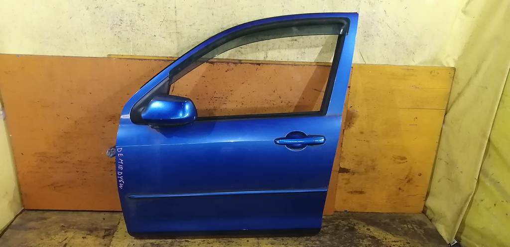 дверь Mazda Demio