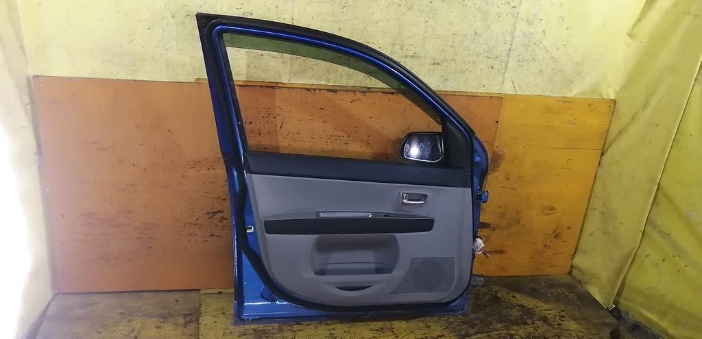 дверь Mazda Demio