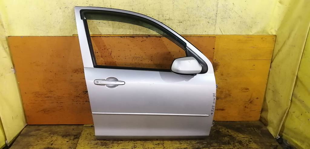 дверь Mazda Demio