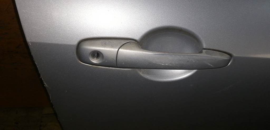 дверь Mazda Demio