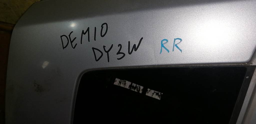 крыло Mazda Demio
