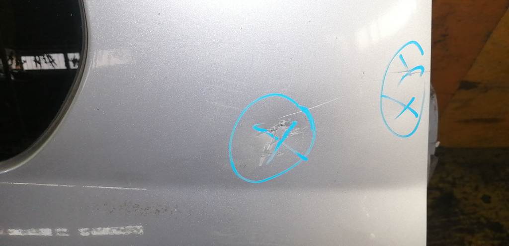 крыло Mazda Demio