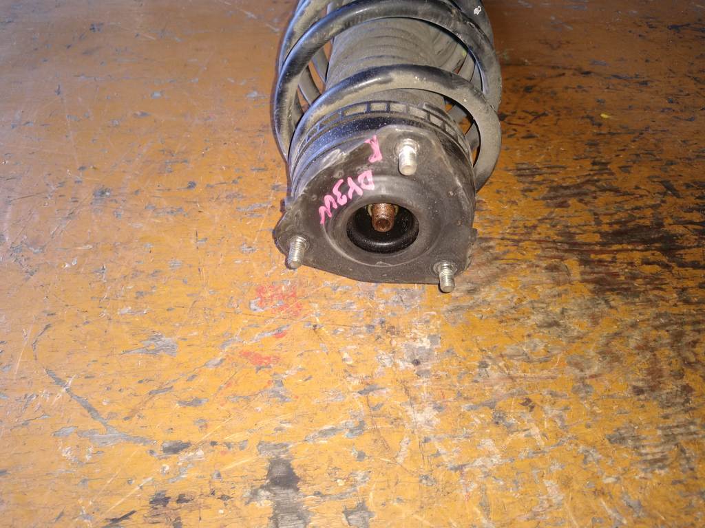 стойка Mazda Demio