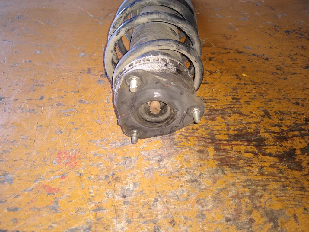 стойка Mazda Demio