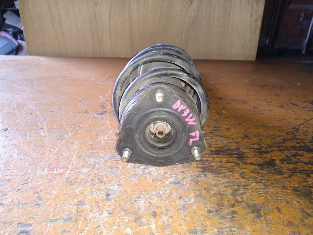 стойка Mazda Demio