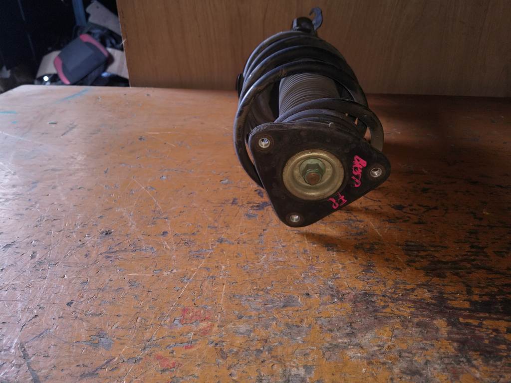 стойка Mazda Axela