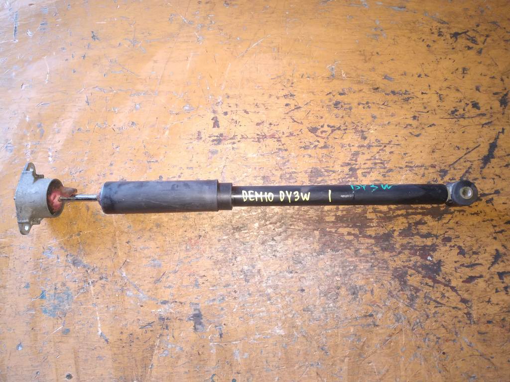 амортизатор Mazda Demio