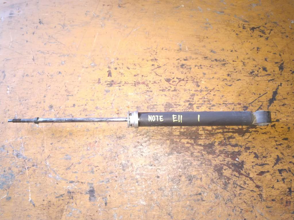 амортизатор Nissan Note