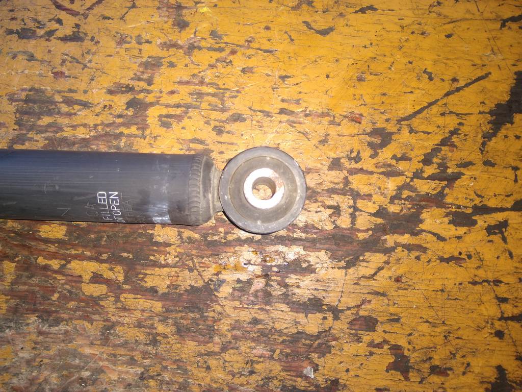 амортизатор Nissan Note