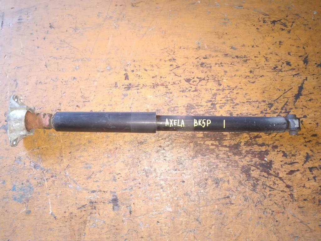 амортизатор Mazda Axela