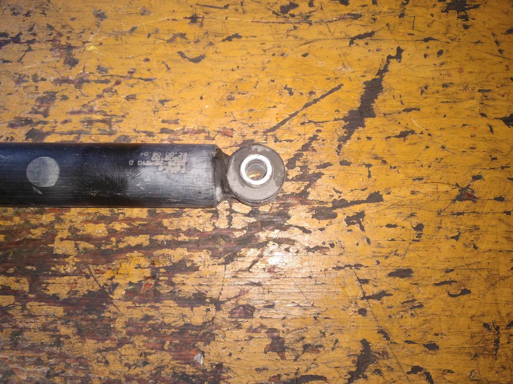 амортизатор Mazda Axela