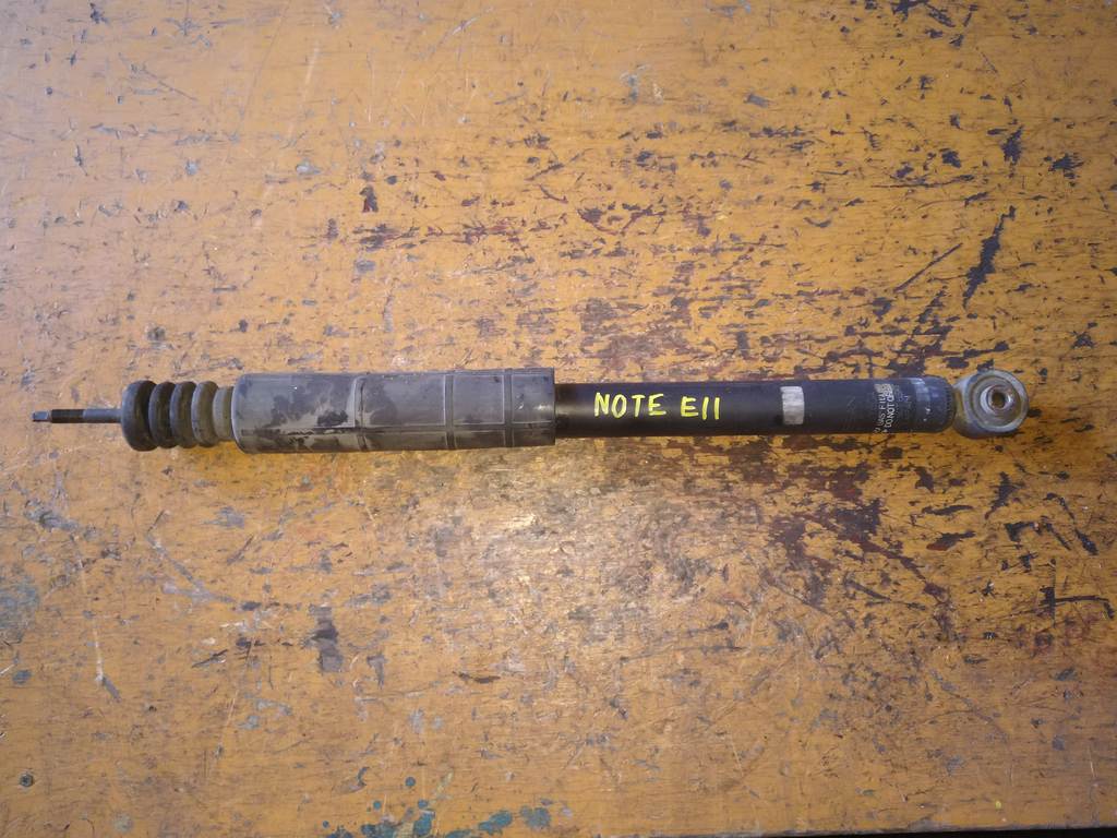 амортизатор Nissan Note