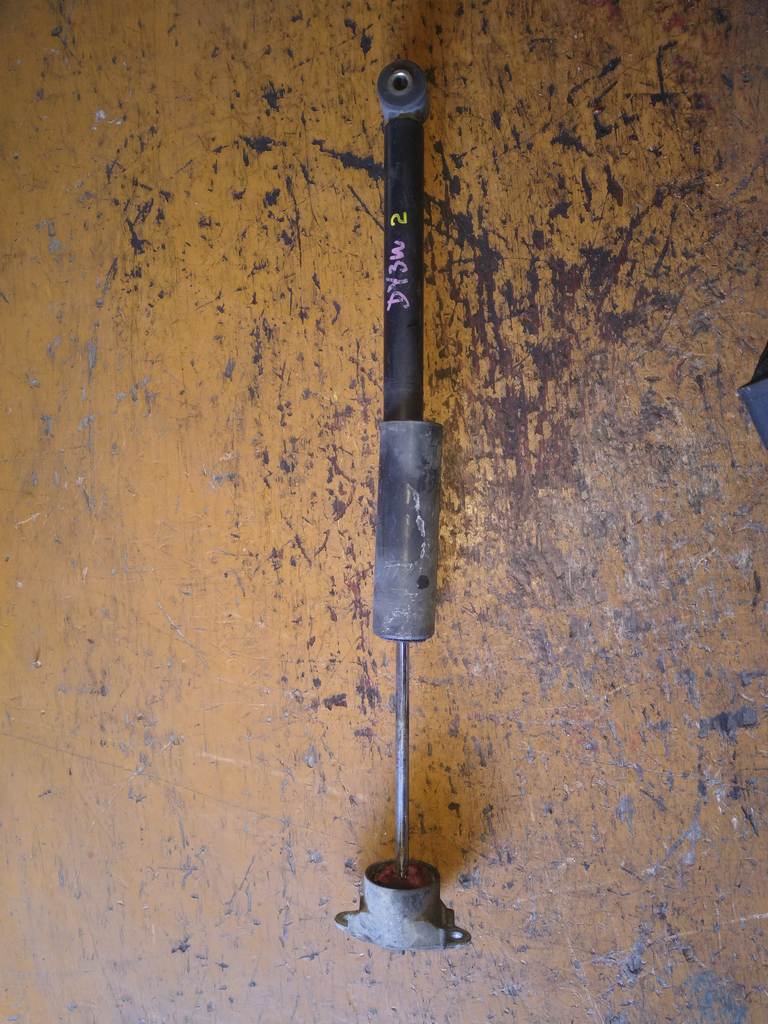 амортизатор Mazda Demio