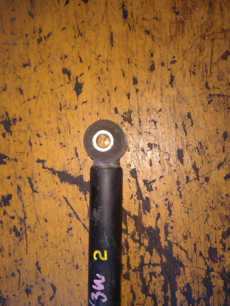 амортизатор Mazda Demio