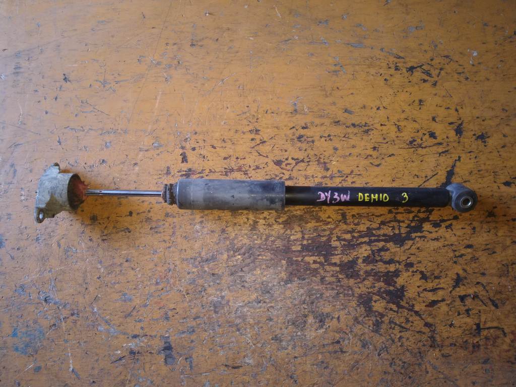 амортизатор Mazda Demio