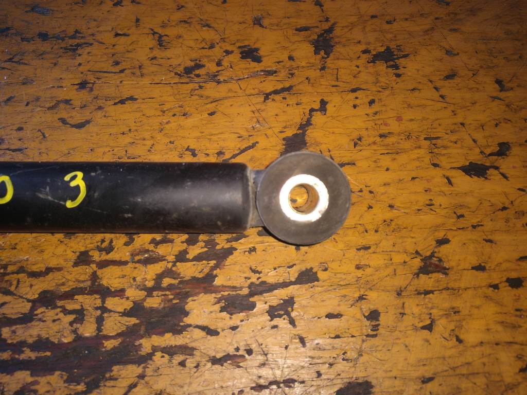 амортизатор Mazda Demio