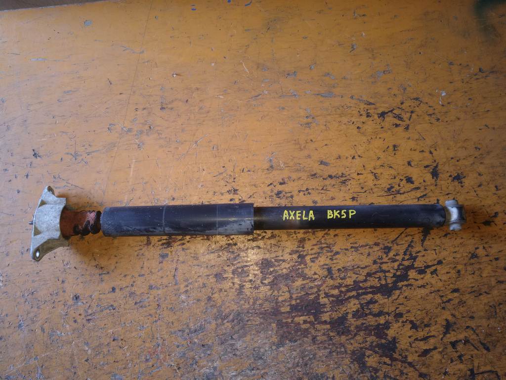 амортизатор Mazda Axela