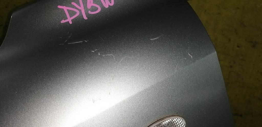 крыло Mazda Demio