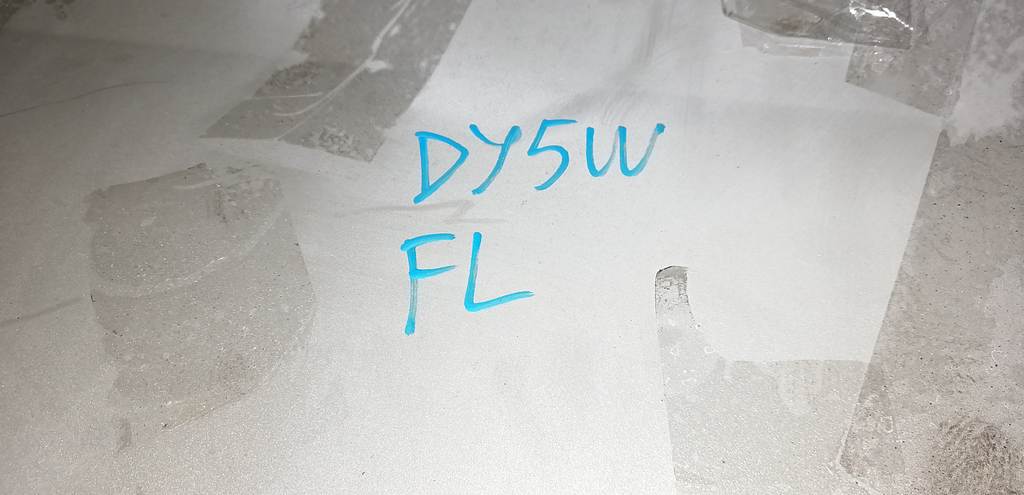 крыло Mazda Demio