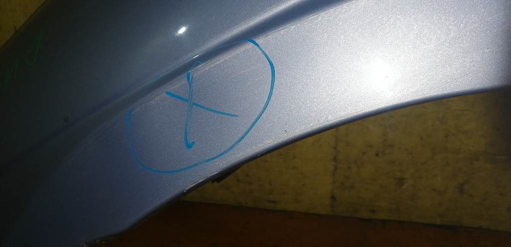 крыло Mazda Demio