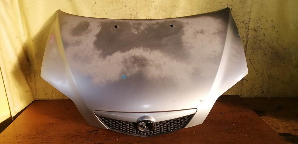 капот Mazda Demio