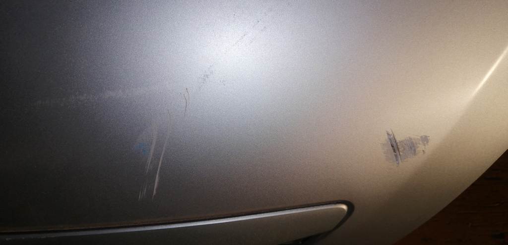 капот Mazda Demio