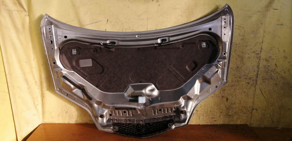 капот Mazda Demio