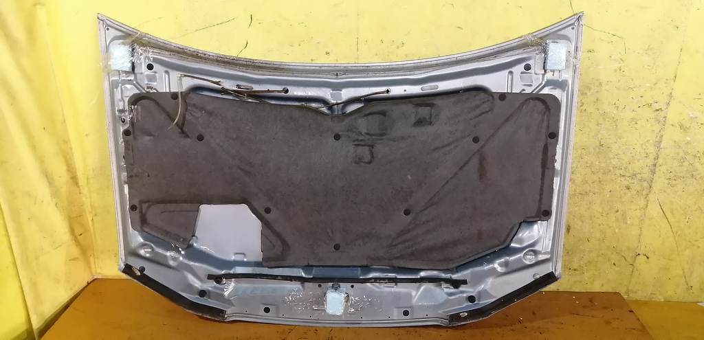 капот Mazda Demio