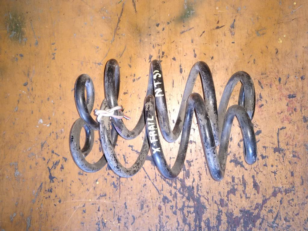 пружина Nissan X-Trail