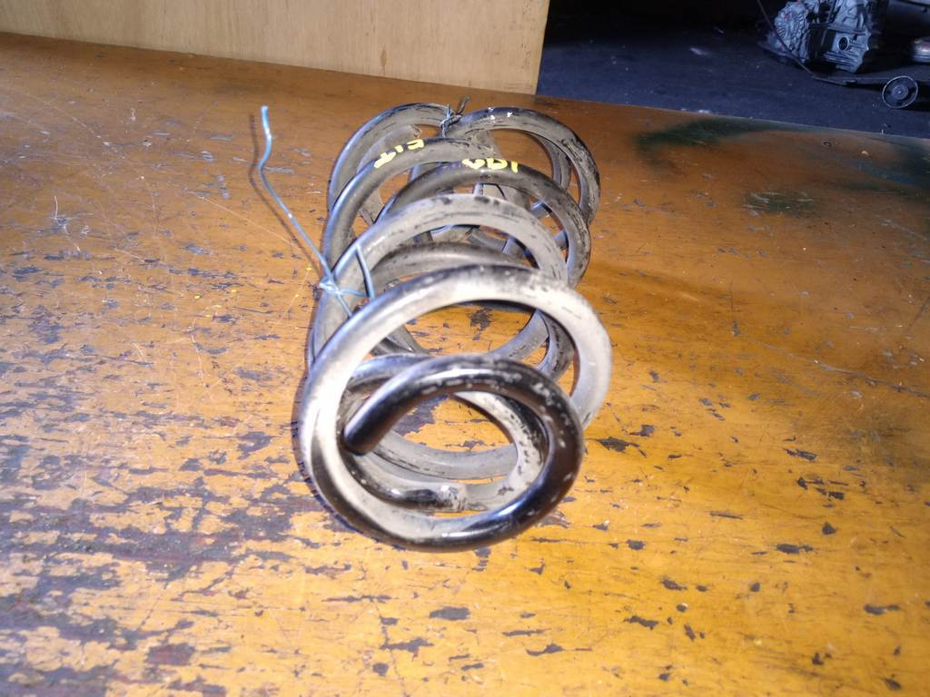 пружина Honda Fit