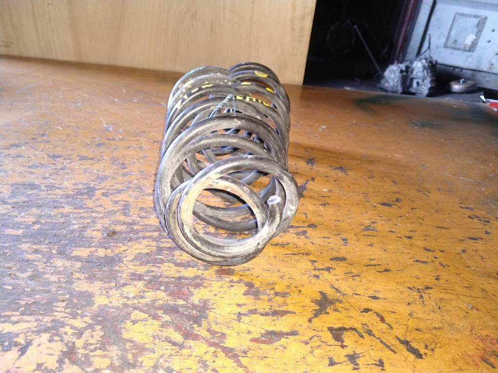 пружина Mazda Demio