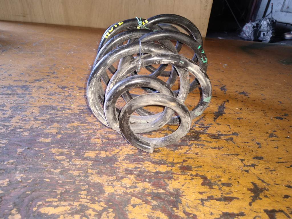 пружина Nissan Note