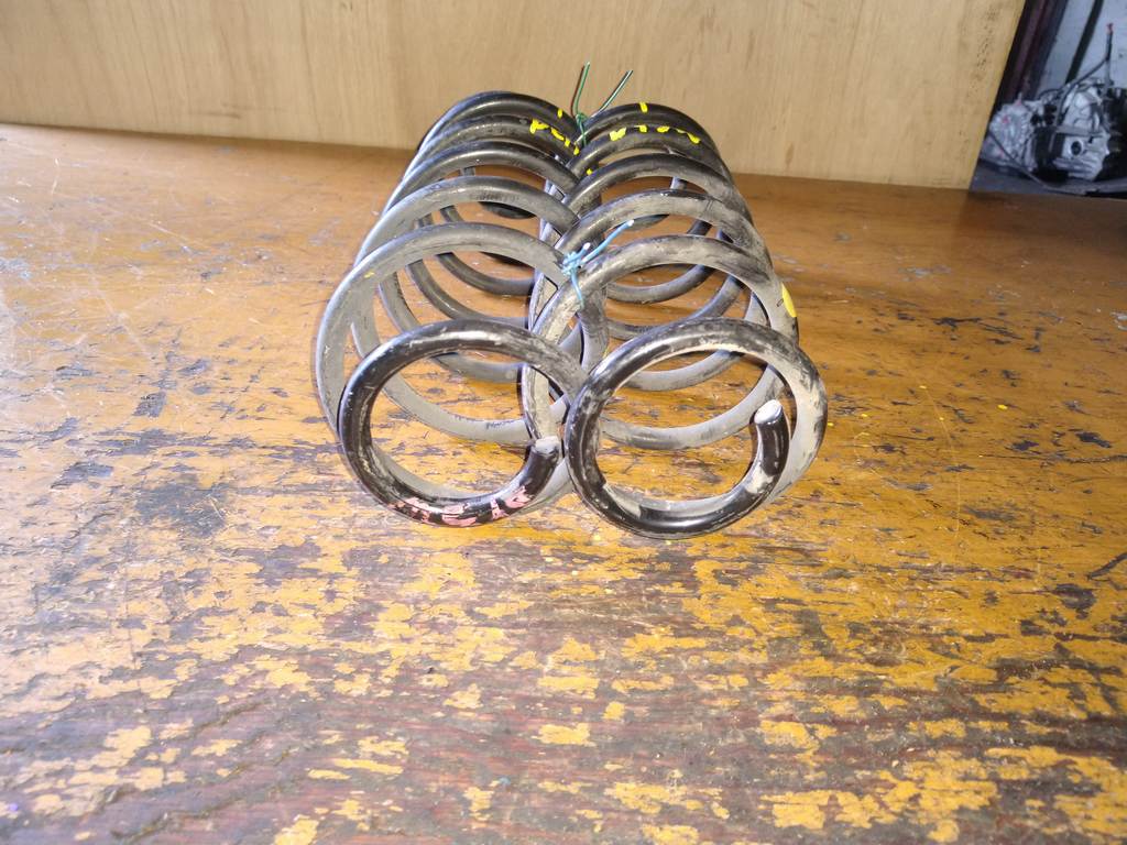 пружина Mazda Demio