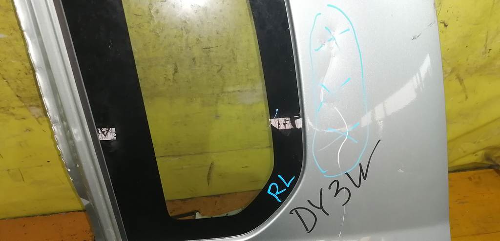 крыло Mazda Demio