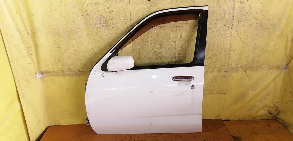 дверь Nissan Cube