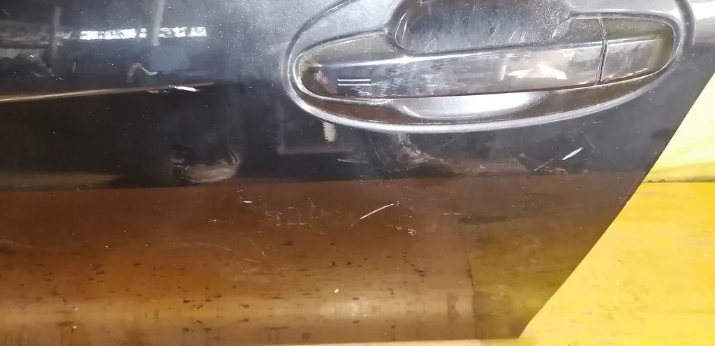 дверь Toyota Vitz